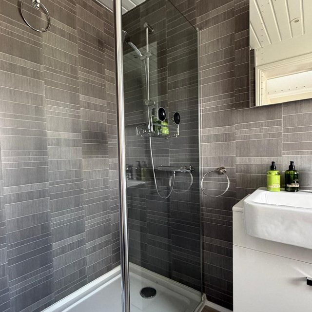 Shower and en-suite cleaned and restocked